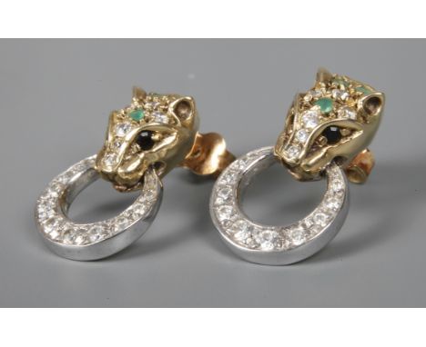 Paar Pantherohrringe mit Steinbesatz um 2000, Weiß- und Gelbgold gestempelt 585, beweglich gearbeitet, in Form eines Pantherk