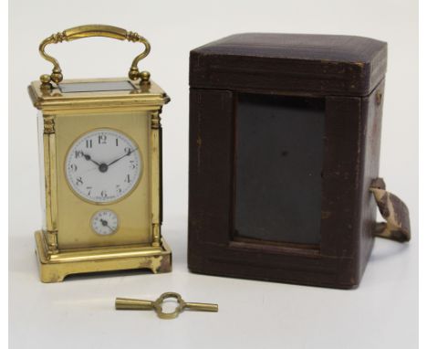 A cased carriage clock, marked '' Made in France'' to dial and movement