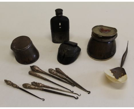 A white metal mounted horse hoof inkwell, a deer slot with bakelite snuff box, another mounted hoof, caviar spoon, a pewter m