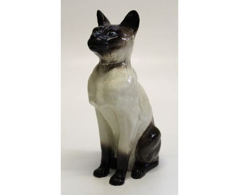 A Beswick ' fireside' model of a seated Siamese cat. Number 2139, 35cm