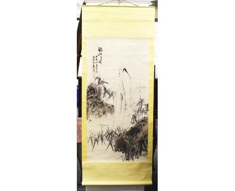ANOTHER CHINESE HANGING SCROLL PICTURE, depicting a standing figure in a landscape of rockwork and bamboo, the picture itself