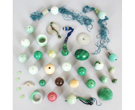 A GOOD ASSORTMENT OF 19TH/20TH CENTURY CHINESE JADE & HARDSTONE BEADS AND PENDANTS ETC, the beads of larger than average size