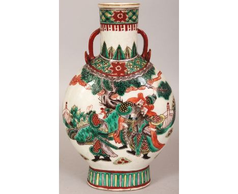 A 19TH CENTURY CHINESE FAMILLE VERTE PORCELAIN PILGRIM'S FLASK, painted with scenes of conversing warriors, the neck with ruy