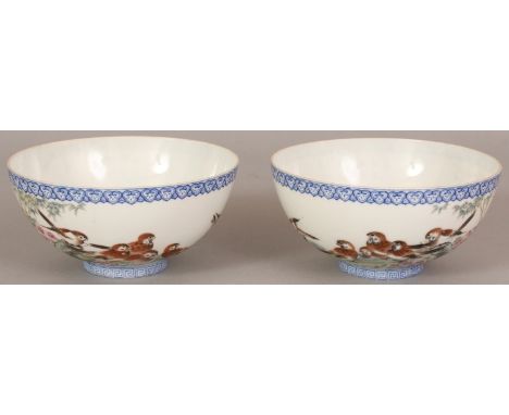 A MIRROR PAIR OF FINE QUALITY 20TH CENTURY CHINESE EGGSHELL PORCELAIN BOWLS, possibly Republic Period, each finely painted wi