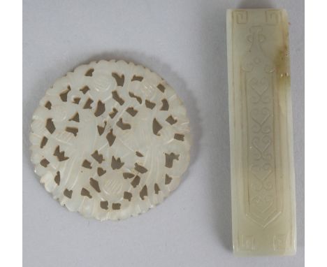 A CHINESE CELADON JADE BELT FITTING, engraved with scroll work, 3.1in long; together with a pierced jade circular plaque deco