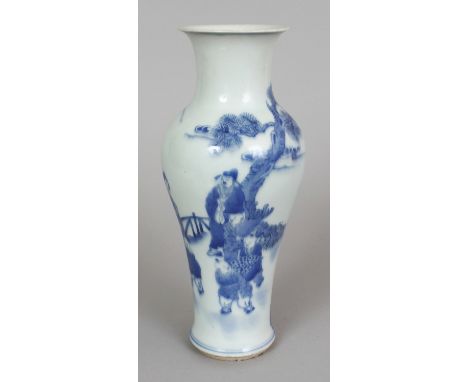 A CHINESE BLUE & WHITE PORCELAIN BALUSTER VASE, decorated with a figural fenced garden scene, the base with a six-character K