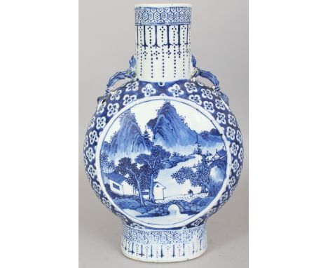 A 19TH CENTURY CHINESE BLUE & WHITE PORCELAIN MOON FLASK, each side painted with a circular mountainous river landscape panel