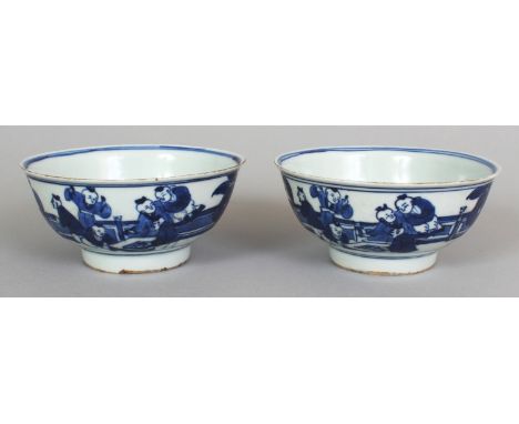 A PAIR OF CHINESE BLUE & WHITE PORCELAIN BOWLS, each decorated with scenes of playing boys, each base with a four-character m