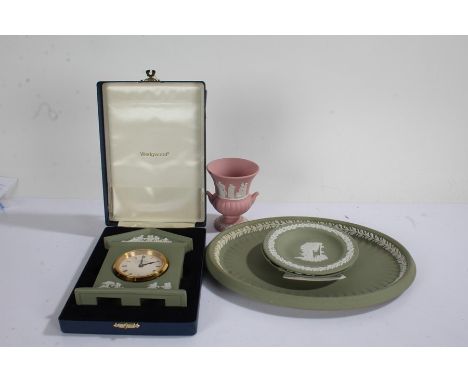 Wedgwood green jasperware, to include mantel clock, of architectural form, in original box, oval plate, ashtray, pin dish, We