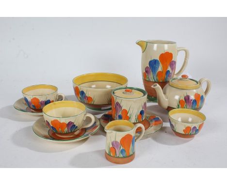 Clarice Cliff Crocus pattern tea set, to include a teapot, bowl, jug, milk jug, two cups and saucers, sugar bowl, small bowl 