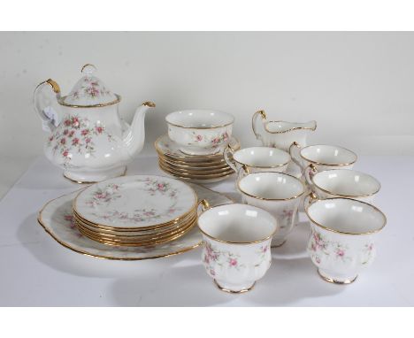 Paragon Victorian Rose tea service, consisting of a teapot, six cups, six saucers, six dishes, milk jug, sugar bowl, and a se