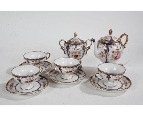 Noritake porcelain part tea service, consisting of four cups and four saucers, together with the coffee pot and sugar bowl