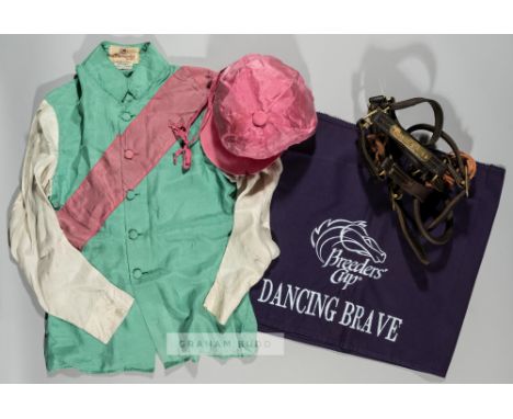 Dancing Brave winning race worn silks from the 1986 Prix de l'Arc de Triomphe at Longchamp,the green jacket with pink seam ru