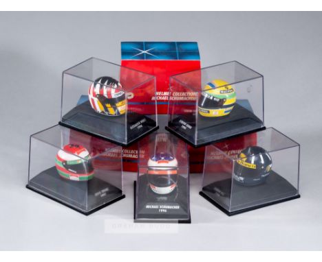 Group of 24 Minichamps 1:8 scale F1 Helmets,Including 6 from the Michael Schumacher collection, others include Senna, Hill, A