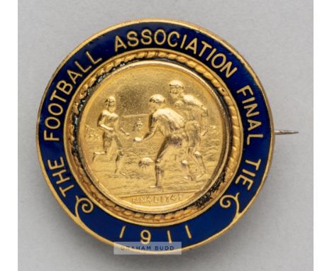 1911 F.A.Cup Final badge issued to the F.A. official Charles James Hughes (1853-1916),in gilt metal and blue enamel the centr