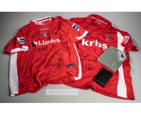 Two red and white Charlton Athletic signed home jerseys, season 2005-06 &amp; 2009-10, comprising a squad signed Marcus Bent 