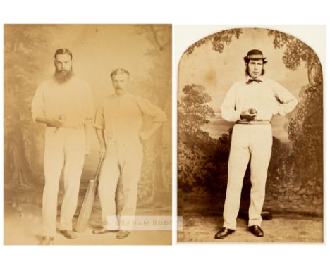 An early photographic portrait of cricketers W G Grace and Henry Jupp, circa 1870s.The two cricketers posing with cricket bal