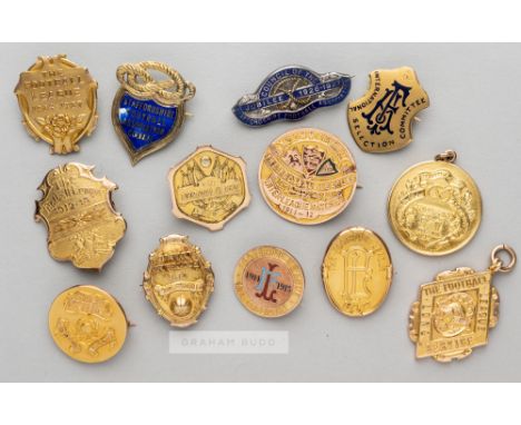 Collection of badges and medals relating to Harry Keys the Staffordshire F.A. and Football League administrator dating betwee