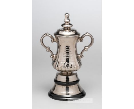A ceramic miniature replica of the F.A. Cup trophy circa 1950s, twin handled with impressed lettering, knopped lid and circul