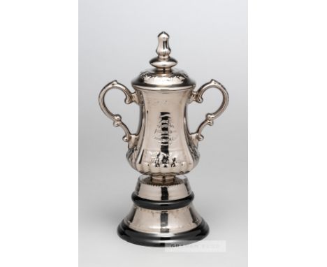 A ceramic miniature replica of the F.A. Cup trophy circa 1950s, twin handled with impressed lettering, knopped lid and circul