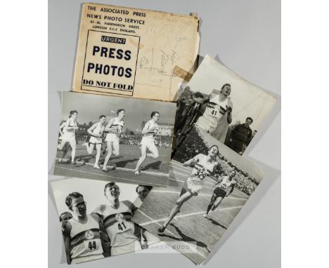 Four b & w press photographs of Roger Bannister,three action photographs and one with team, 15 by 20cm., (4)Roger Bannister i