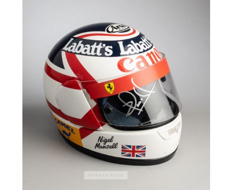 Nigel Mansell full scale 1992 Williams replica F1 helmet,with Ferrari visor signed in silver marker pen in a perspex display 