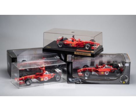 Group of thirteen Ferrari 1:18 scale model cars, predominantly Hotwheels all in original boxes, Various Ferrari F1 cars and d