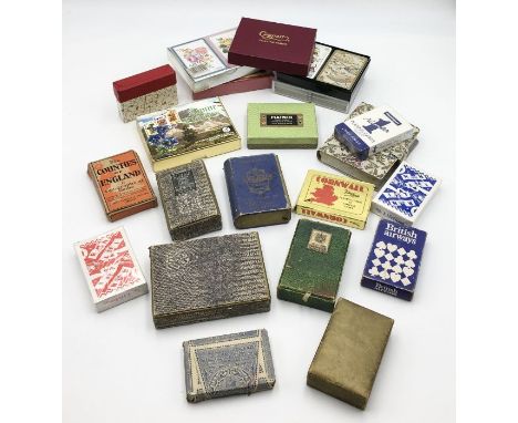 A collection of various vintage playing cards including four packs by De La Rue Stationers, London..