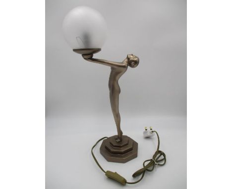 An art deco style lamp, the stem formed as a nude lady