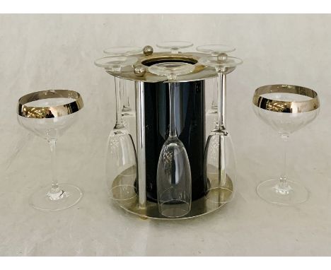 Vintage ice bucket with six champagne flutes along with two others
