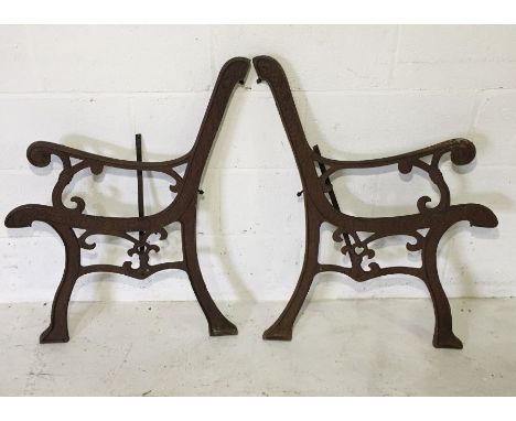 A pair of cast iron bench ends