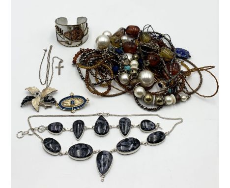 A collection of costume jewellery including silver necklace and matching bracelet