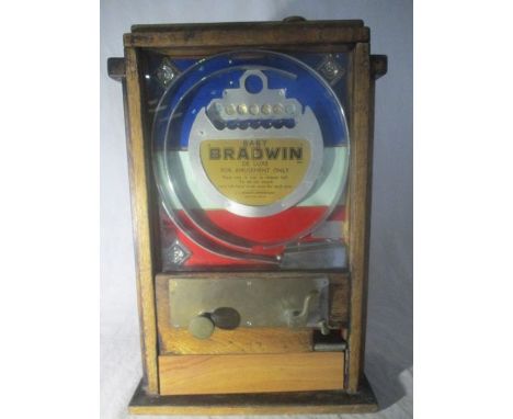 A Baby Bradwin De Luxe amusement arcade penny slot machine by L C Bradwin, Birmingham