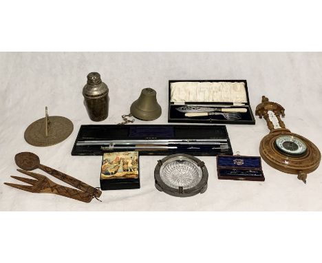 A collection of assorted items including a bell, cocktail shaker, barometer, Stanley compass and other technical drawing inst