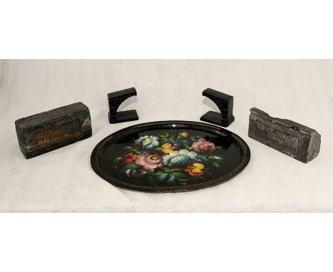 A Queen Victoria Diamond Jubilee and a King George V 1910 commemorative brick along with a pair of cast iron book ends and a 