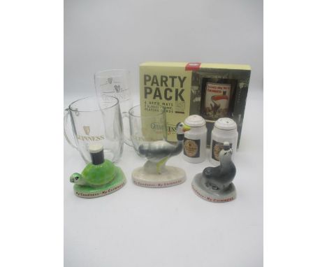 A small collection of Guinness ceramic and glassware including Turtle, Seal, Ostrich, Pint and matching half pint tankard etc