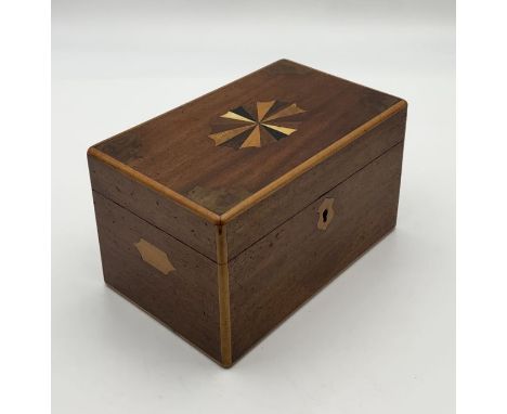 A Georgian inlaid tea caddy 
