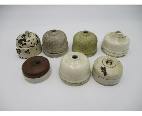 A collection of seven Edwardian light switches