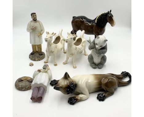 A collection of various ornaments including two Beswick green label milk jugs in the form of cows, a Beswick Shire horse (dam