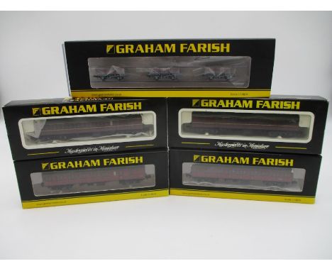 A collection of four various boxed Graham Farish by Bachmann N Gauge Suburban railway coaches (two maroon, two crimson, along