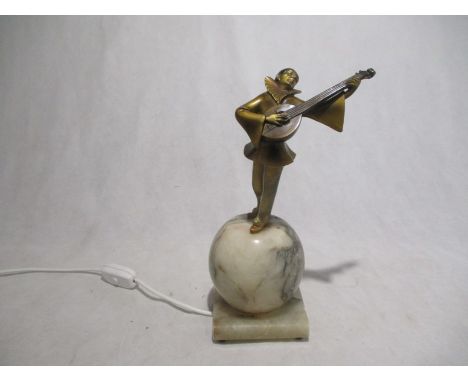 A vintage Pierrot lamp on alabaster sphere
