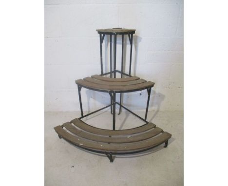 A garden corner plant stand. (Lower front bracket needs to be secured.)