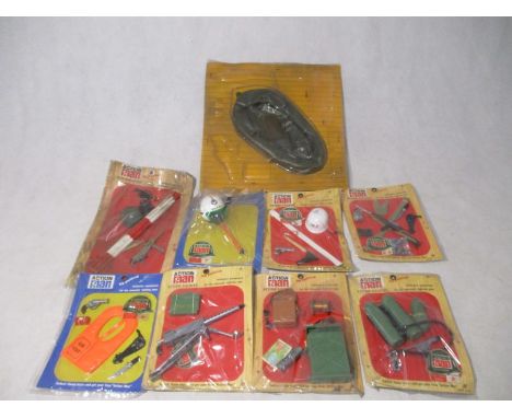 A collection of eight Action Man authentic equipment packs including small arms, flame thrower, crash helmet, machine gun, sc