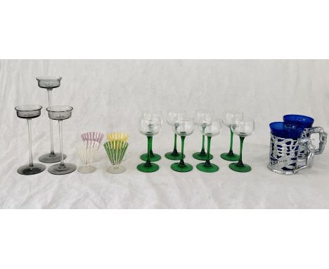 A collection of glassware including long stem glasses, vintage ice cream glasses, Wedgwood candle holders etc.