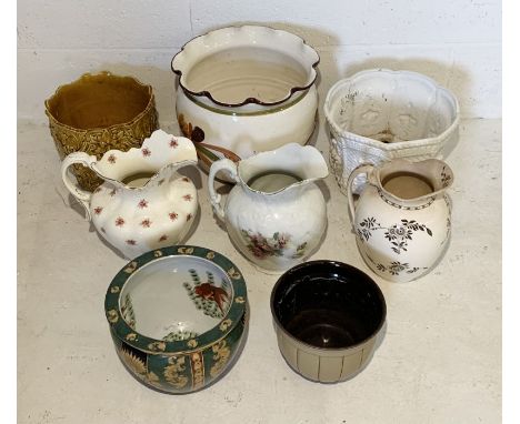 A collection of ceramic jugs and pots including Regency Stoneware fish bowl etc.