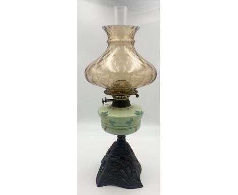 A Victorian oil lamp with shade and chimney on brass base, Duplex burner to top.