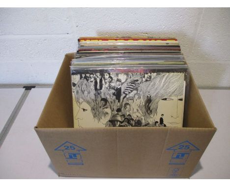 A collection of various 12" vinyl records including The Beatles, Fleetwood Mac, The Rolling Stones, John Lennon, Elton John, 