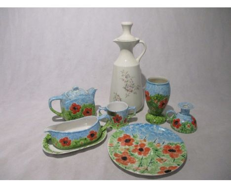 A collection of seven pieces of Honiton Pottery "Poppy" design including a vase, plate, double handled cup, candle holder,  g