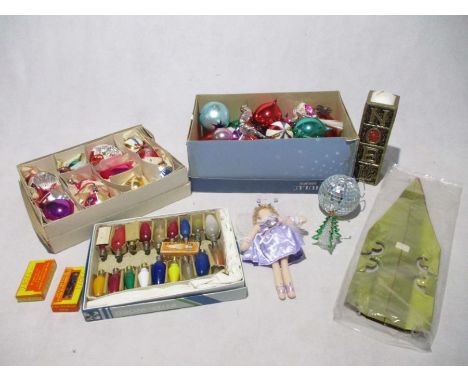 A collection of vintage Christmas decorations including a selection of baubles, Christmas light bulbs, Noel candle, fairy etc