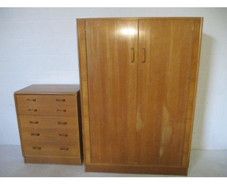 A vintage G-Plan light oak wardrobe by E.Gomme, along with a matching chest of five drawers 